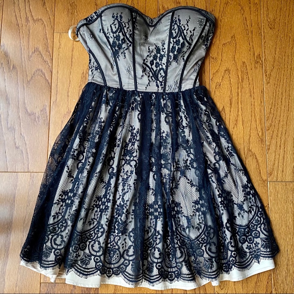Guess | strapless black lace over cream bodice.